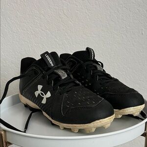 Under Armour Black and White Kids Athletic Cleats